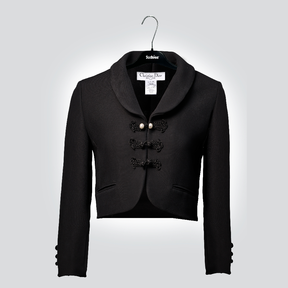 Black Christian Dior cropped jacket on a Sudsies hanger